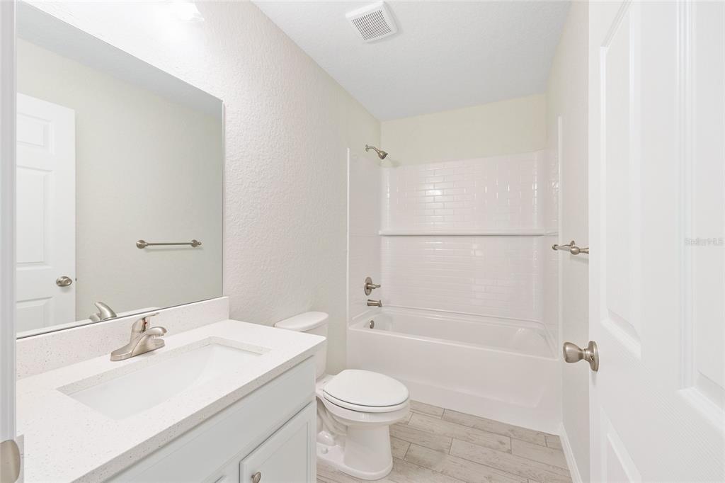 360 Locust Road Ocala, FL 34472 - Photo 28 of 48 a bathroom with a sink toilet and shower