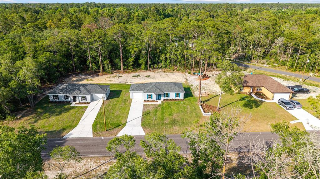 360 Locust Road Ocala, FL 34472 - Photo 33 of 48 a view of swimming pool with a patio