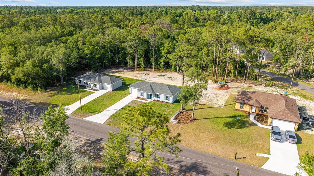 360 Locust Road Ocala, FL 34472 - Photo 35 of 48 an aerial view of a house with a swimming pool