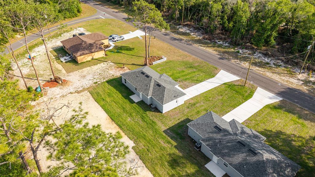 360 Locust Road Ocala, FL 34472 - Photo 43 of 48 a view of an outdoor space and swimming pool