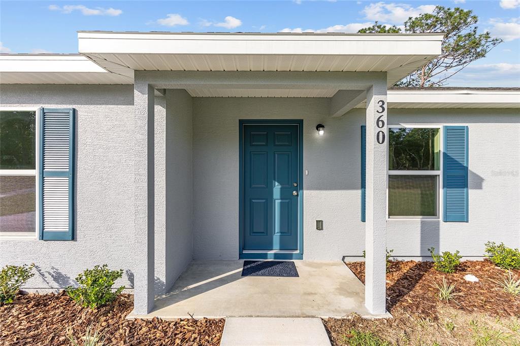 360 Locust Road Ocala, FL 34472 - Photo 10 of 48 a view of a entryway front of a house