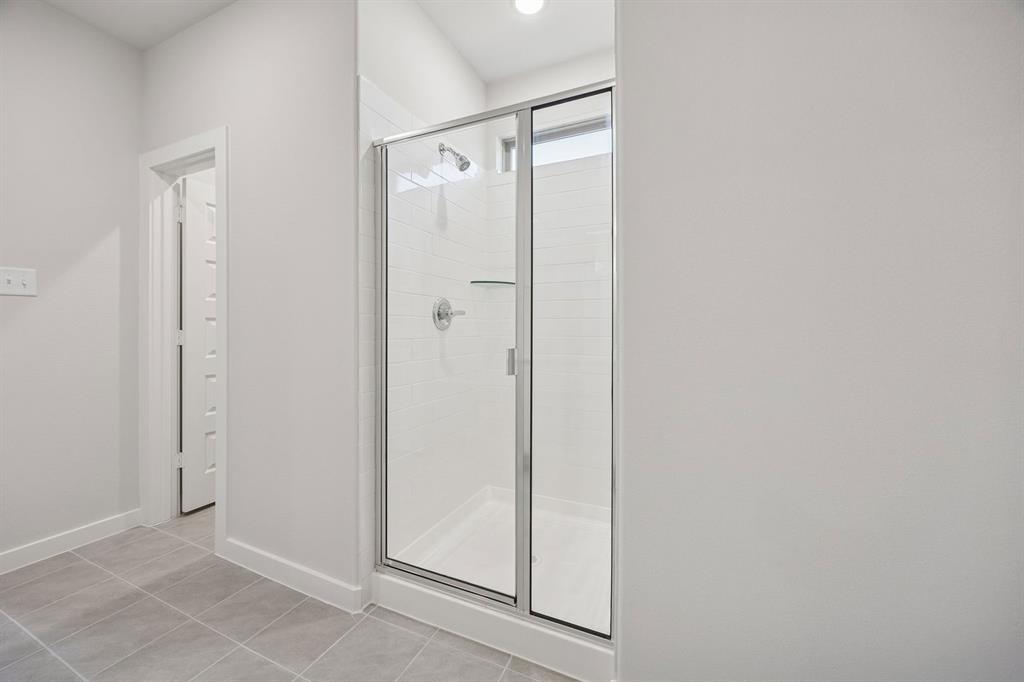 316 Millwood Road Lavon, TX 75166 - Photo 20 of 37 Primary Bathroom in the Oak II home plan by Trophy Signature Homes – REPRESENTATIVE PHOTO