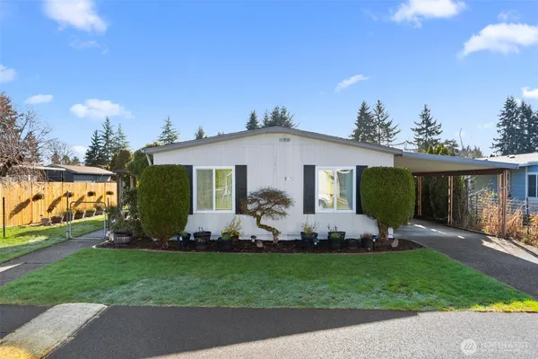 a front view of house with yard