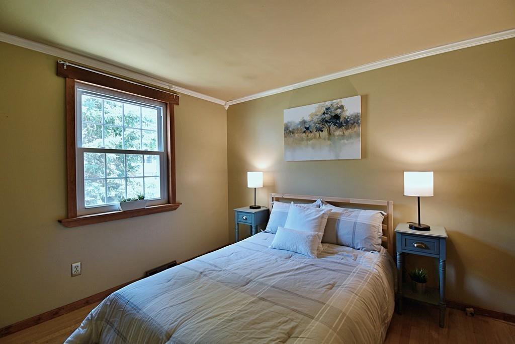 16 Emeline Road Weymouth, MA 02189 - Photo 15 of 40 a bedroom with a bed and a window