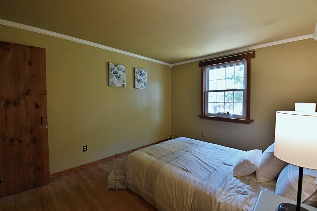 16 Emeline Road Weymouth, MA 02189 - Photo 18 of 40 a bedroom with a bed and a window