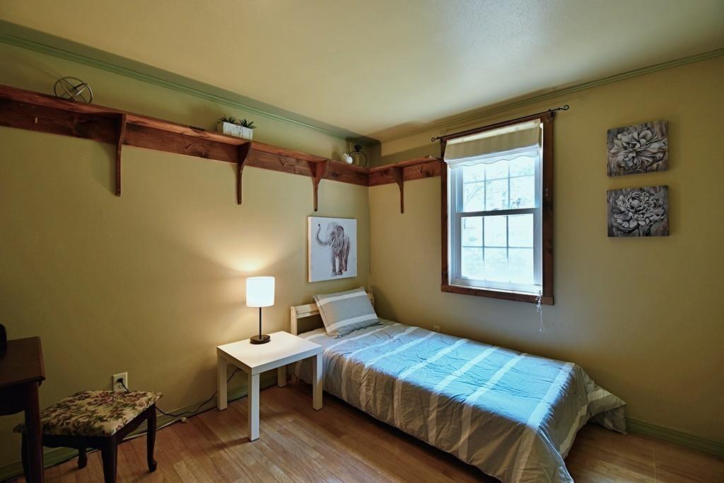 16 Emeline Road Weymouth, MA 02189 - Photo 20 of 40 a bedroom with a bed and a window