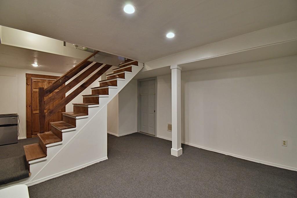16 Emeline Road Weymouth, MA 02189 - Photo 29 of 40 a view of an empty room with stairs