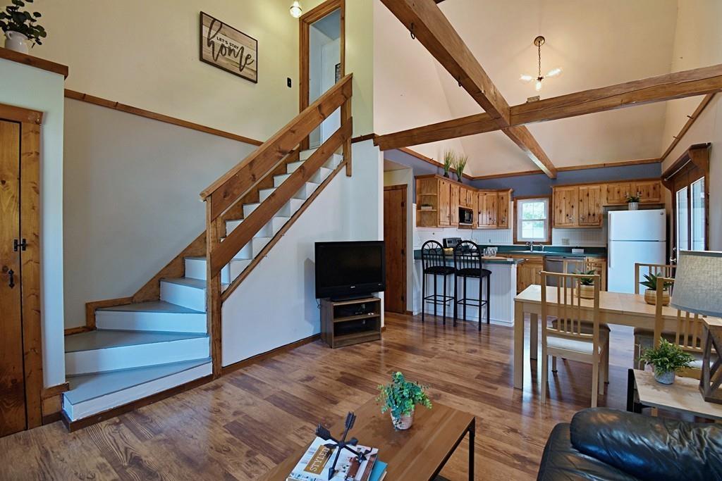 16 Emeline Road Weymouth, MA 02189 - Photo 3 of 40 a view of a livingroom with furniture staircase and kitchen view