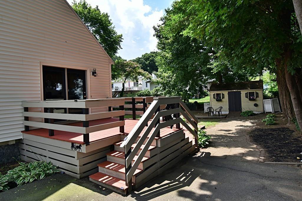 16 Emeline Road Weymouth, MA 02189 - Photo 35 of 40 a view of outdoor space deck and tree