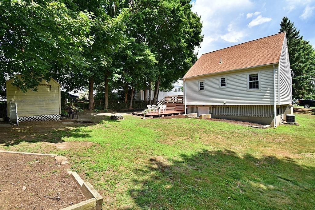 16 Emeline Road Weymouth, MA 02189 - Photo 40 of 40 a front view of house with yard and green space