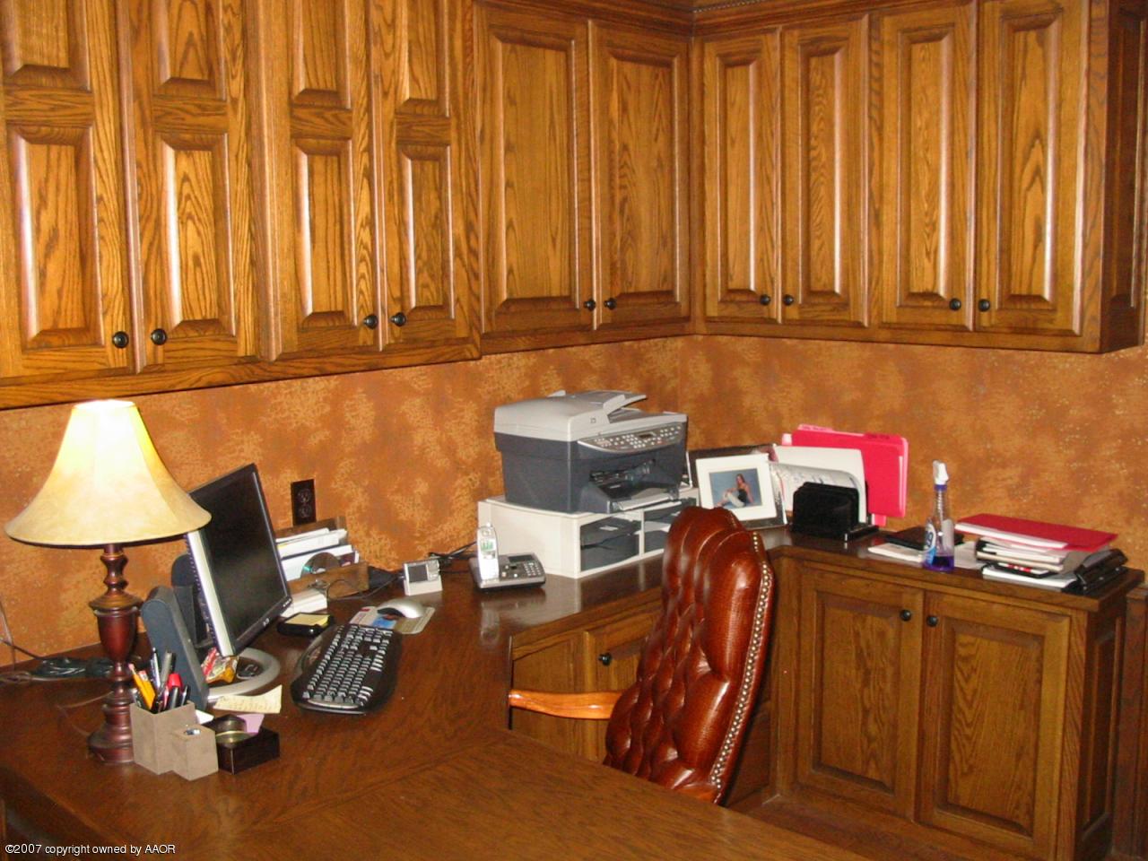 8900 Blackhawk Road Amarillo, TX 79119 - Photo 9 of 13 a view of a room with gym equipment