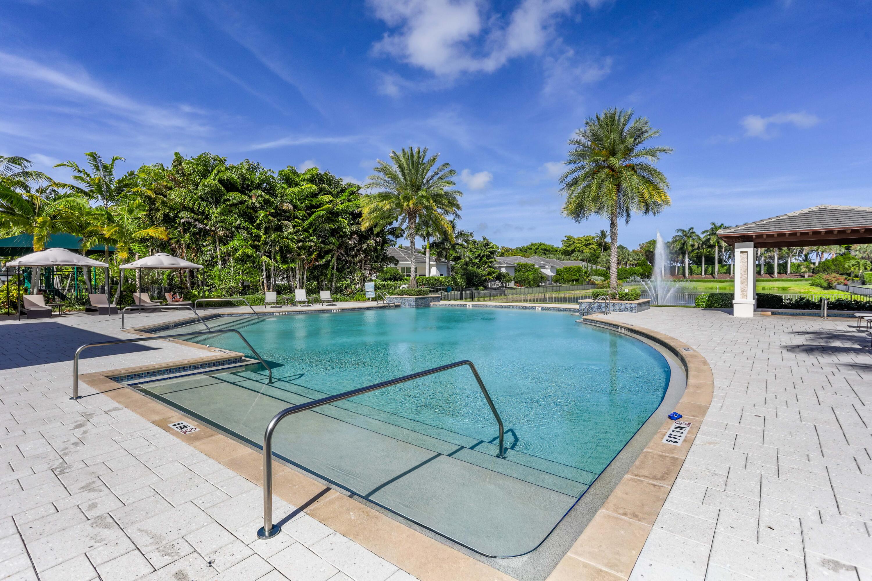 6903 Northwest 28th Avenue Boca Raton, FL 33496 - Photo 65 of 69 a view of a swimming pool with a patio
