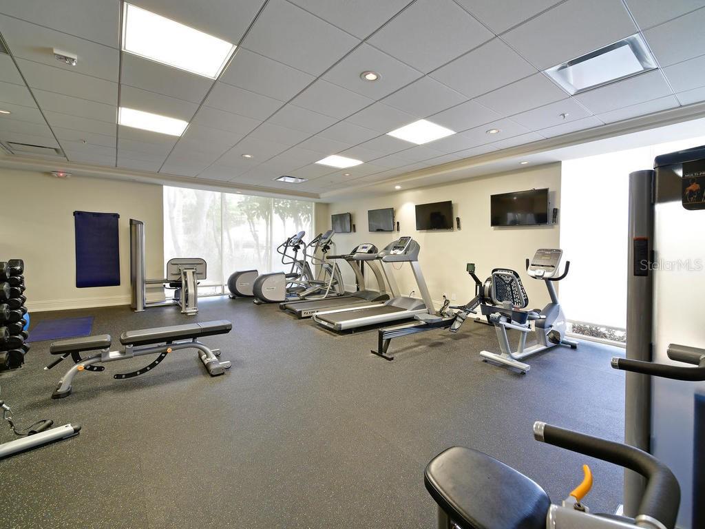 2425 Gulf Of Mexico Drive, Unit 7F Longboat Key, FL 34228 - Photo 26 of 50 a view of a room with gym equipment