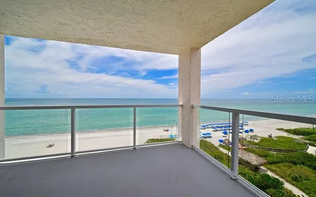 a view of a room with yard from balcony