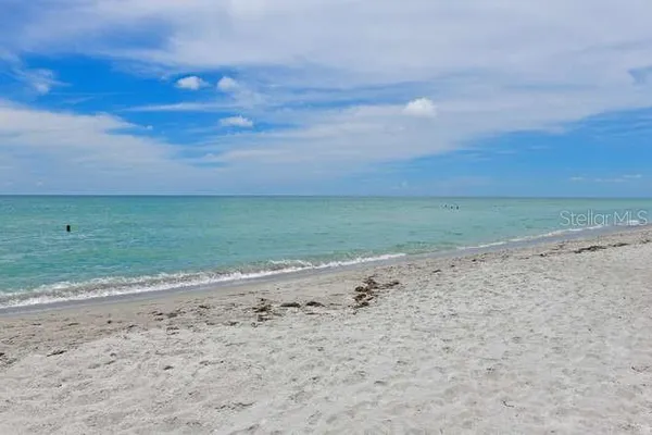 a view of a beach and a yard