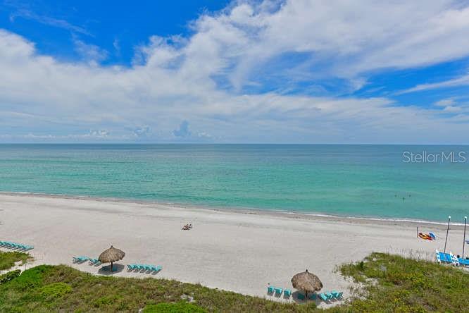 2425 Gulf Of Mexico Drive, Unit 7F Longboat Key, FL 34228 - Photo 6 of 50 a view of a lake with a big yard