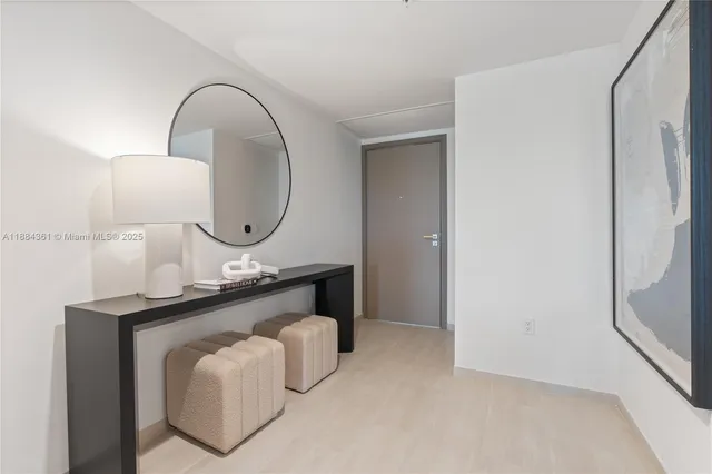 a view of a house with a backyard porch and sitting area