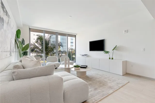 a living room with furniture and a couch