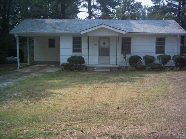 3342 Ebenezer Church Road Benson, NC 27504 - Photo 1 of 8 a view of a house with a yard