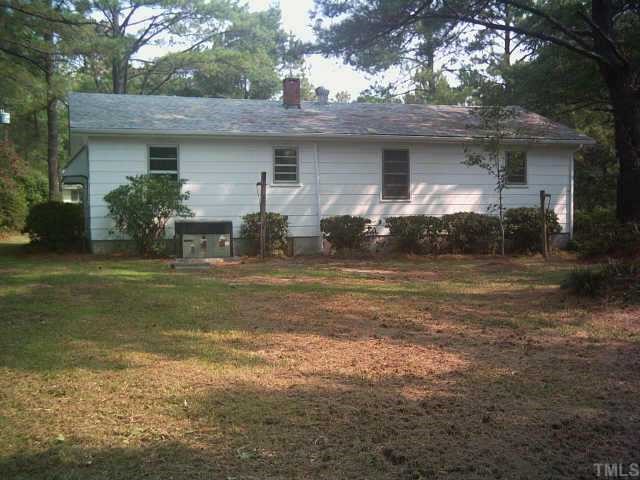 3342 Ebenezer Church Road Benson, NC 27504 - Photo 2 of 8 a front view of house with yard