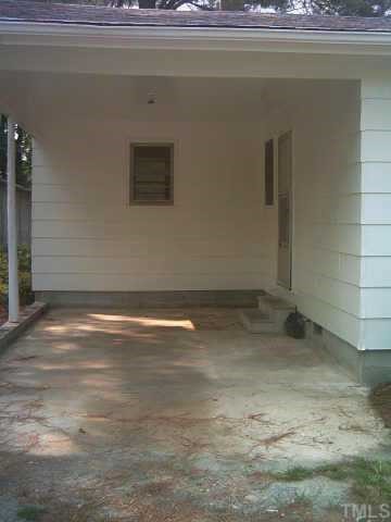 3342 Ebenezer Church Road Benson, NC 27504 - Photo 3 of 8 a view of a room with an empty space