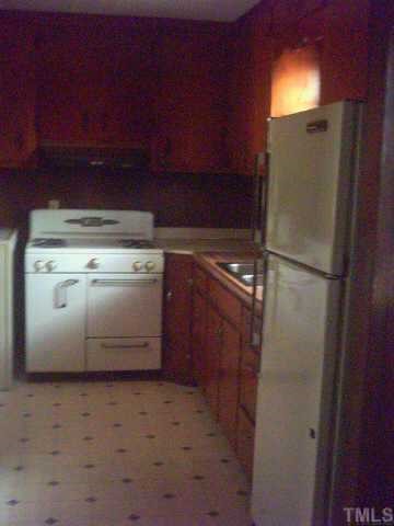 3342 Ebenezer Church Road Benson, NC 27504 - Photo 6 of 8 a utility room with dryer and washer