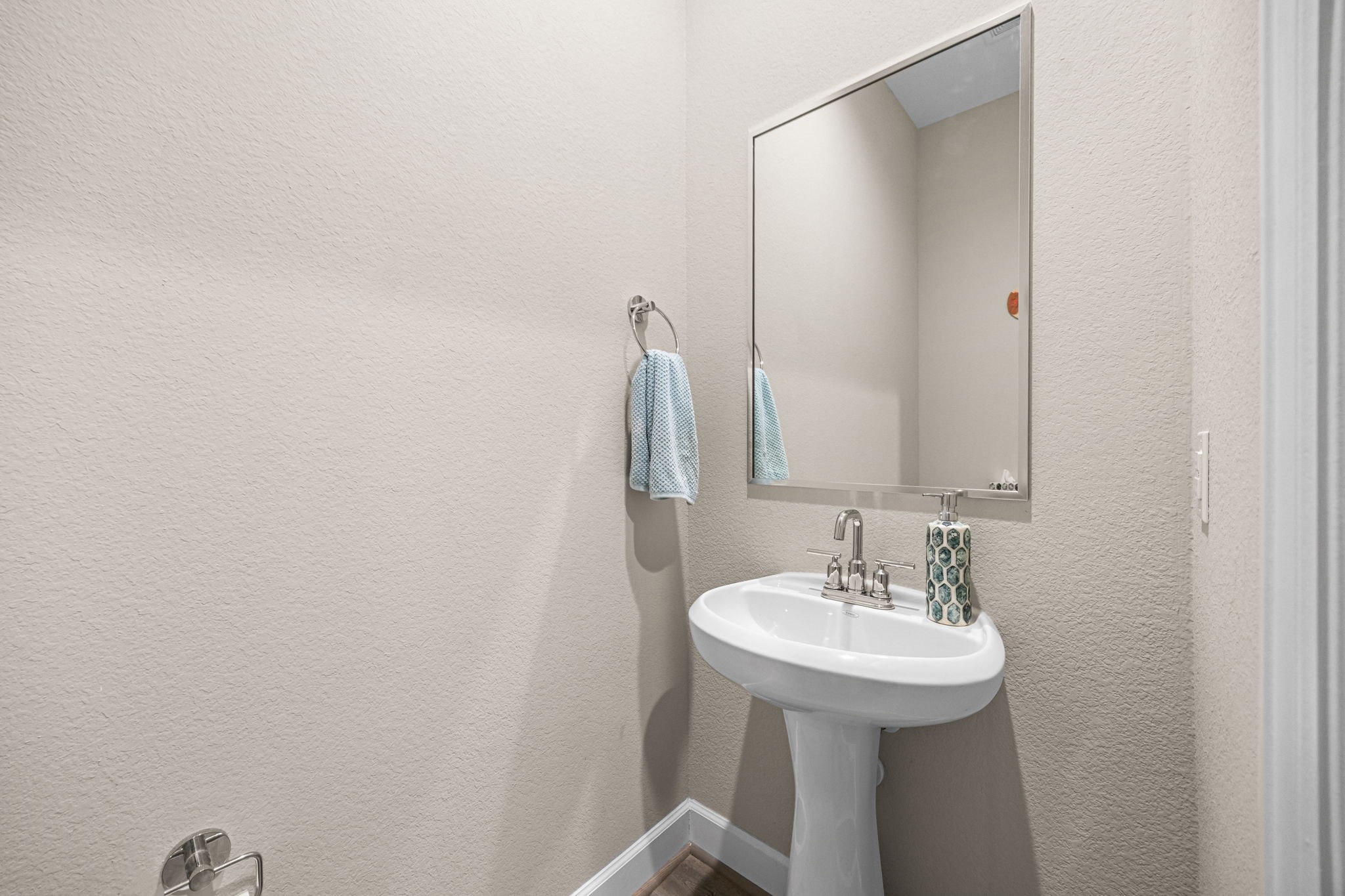 1732 Wichita Street Houston, TX 77004 - Photo 14 of 35 Convenient first-floor powder bath with pedestal sink and modern fixtures.