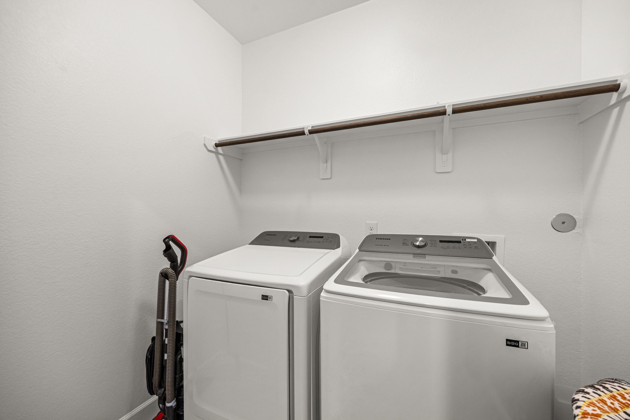 1732 Wichita Street Houston, TX 77004 - Photo 28 of 35 Dedicated laundry room with washer and dryer included plus additional overhead storage space.