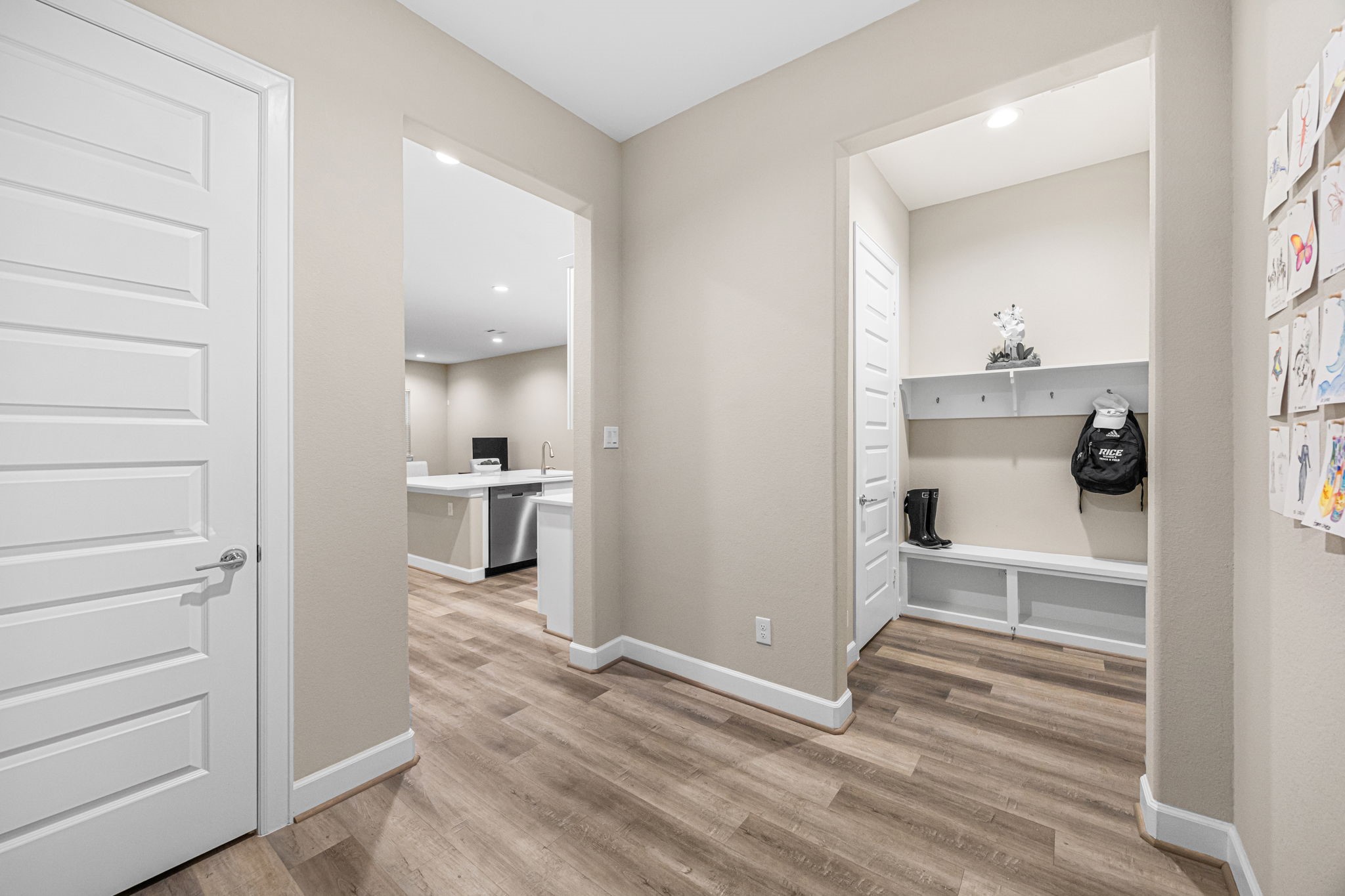1732 Wichita Street Houston, TX 77004 - Photo 29 of 35 Functional mudroom entry with built-in storage cubbies and convenient access to the main living areas.