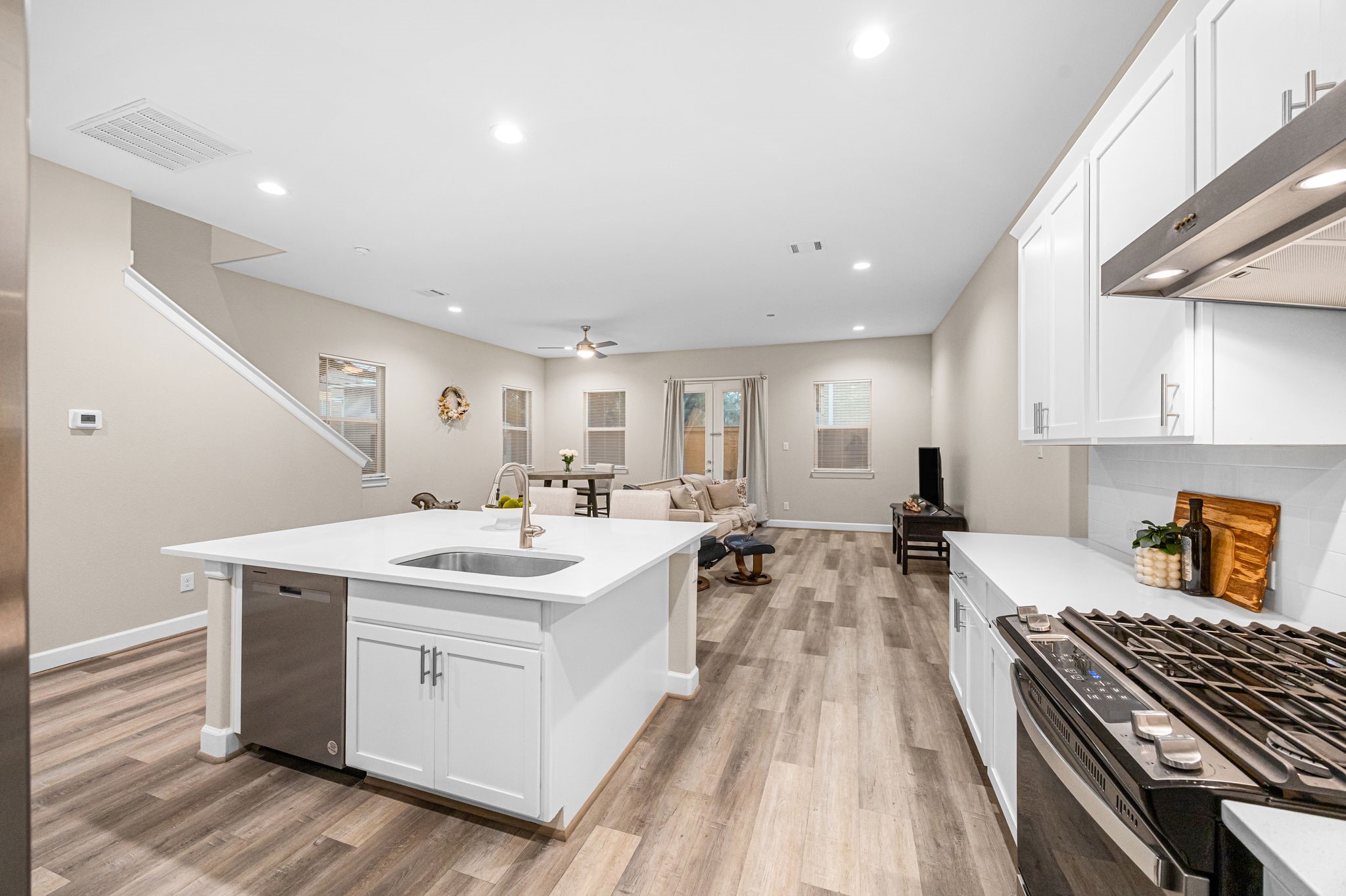 1732 Wichita Street Houston, TX 77004 - Photo 7 of 35 Open-concept living and kitchen area designed for easy entertaining with seamless flow between spaces and plenty of natural light.