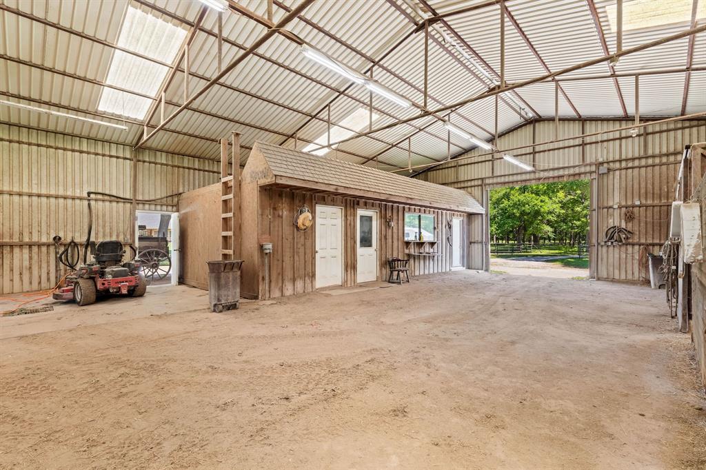 145 Indian Trail Decatur, TX 76234 - Photo 27 of 40 a view of a car garage