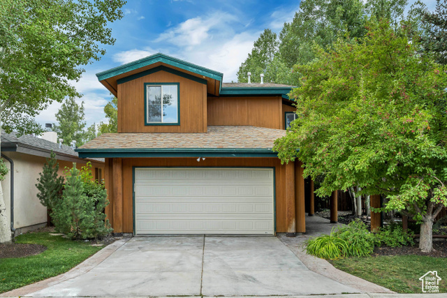 1037 Station Loop Road Park City, UT 84098 - Photo 1 of 1 View of front of property featuring concrete driveway and an attached garage