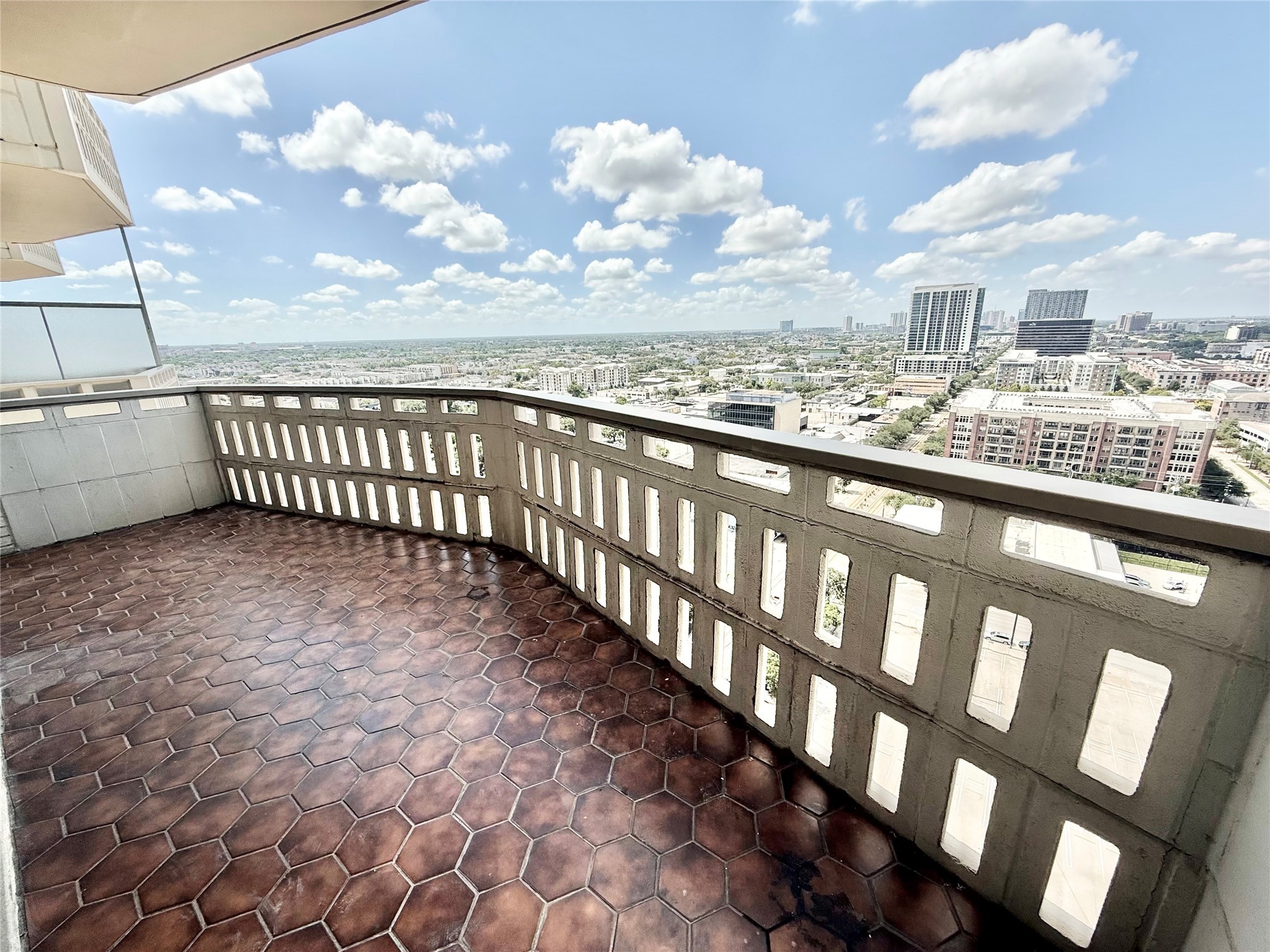 2016 Main, Unit 1904 Houston, TX 77002 - Photo 16 of 40 full balcony with access door in the living room and primary bedroom