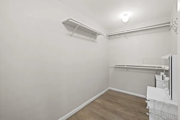 a view of an empty walk in closet