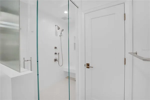 a view of a livingroom with furniture and front door