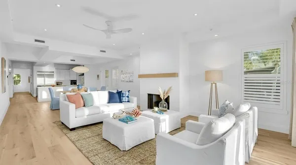 a spacious bedroom with a bed and a large window