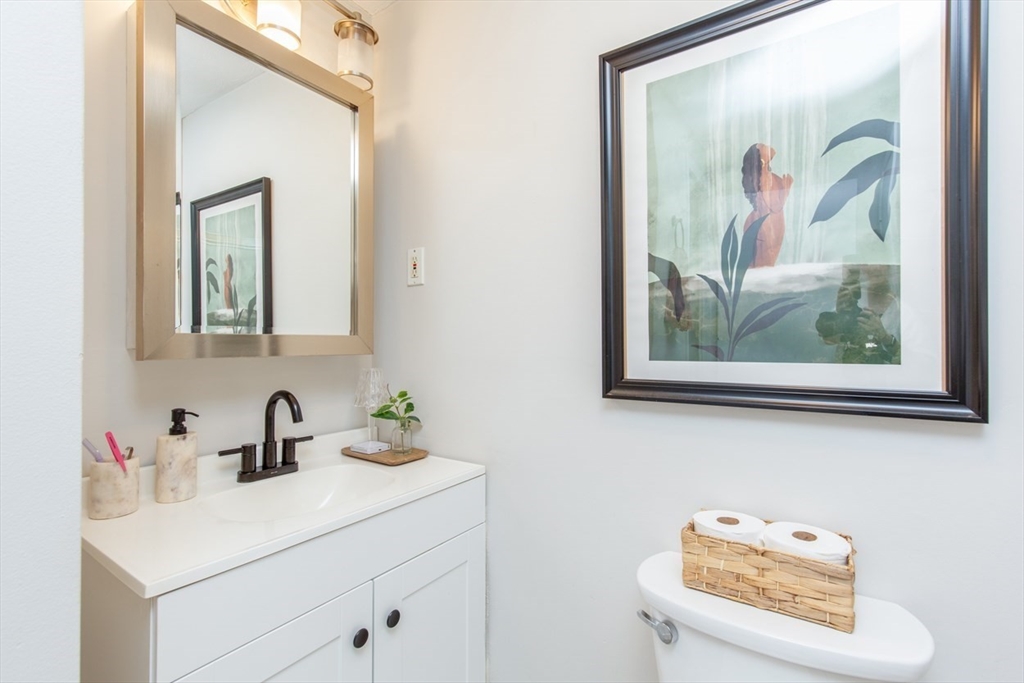15 Staples Avenue, Unit 46 Everett, MA 02149 - Photo 26 of 35 a bathroom with a sink and a mirror