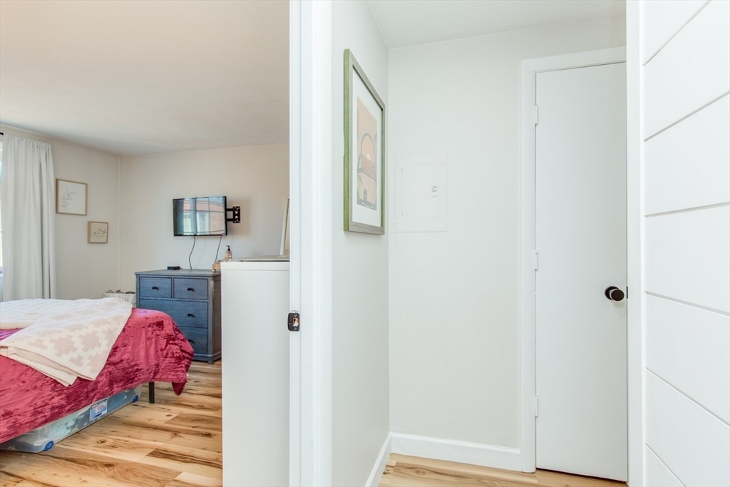 15 Staples Avenue, Unit 46 Everett, MA 02149 - Photo 27 of 35 a bedroom with a bed and a closet