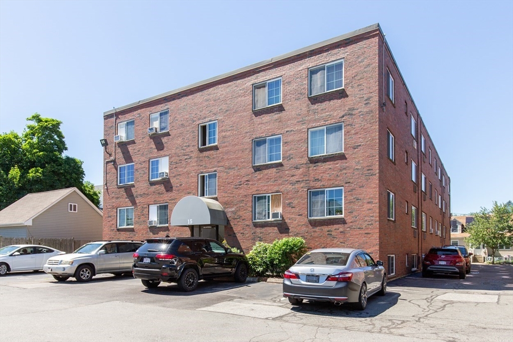 15 Staples Avenue, Unit 46 Everett, MA 02149 - Photo 30 of 35 a car parked in front of a building