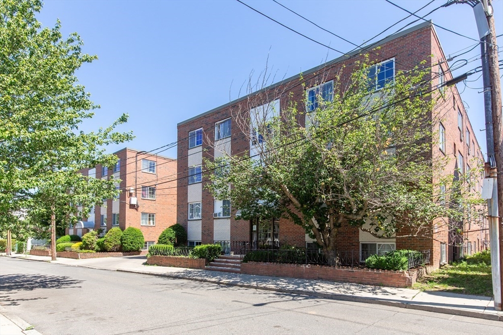 15 Staples Avenue, Unit 46 Everett, MA 02149 - Photo 34 of 35 front view of a building with street view