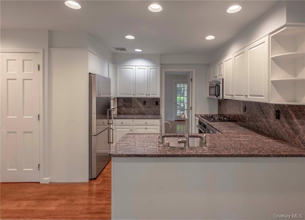62 Summit Avenue Bronxville, NY 10708 - Photo 11 of 24 Kitchen with laundry room leading into the Dining Room