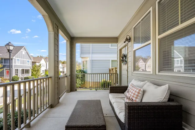 a view of a porch with furniture