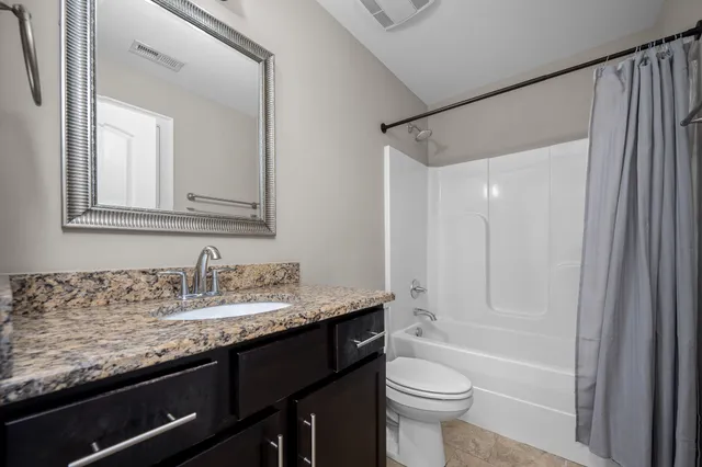 a view of balcony with chairs