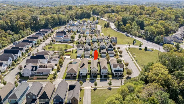 a picture of a bench in front of a building