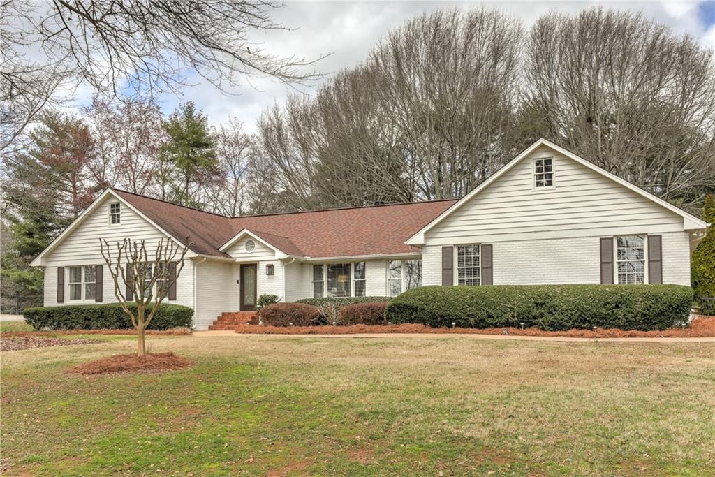 565 Cox Road Roswell, GA 30075 - Photo 1 of 1 Beautiful Brick Ranch in the heart of Roswell!!
