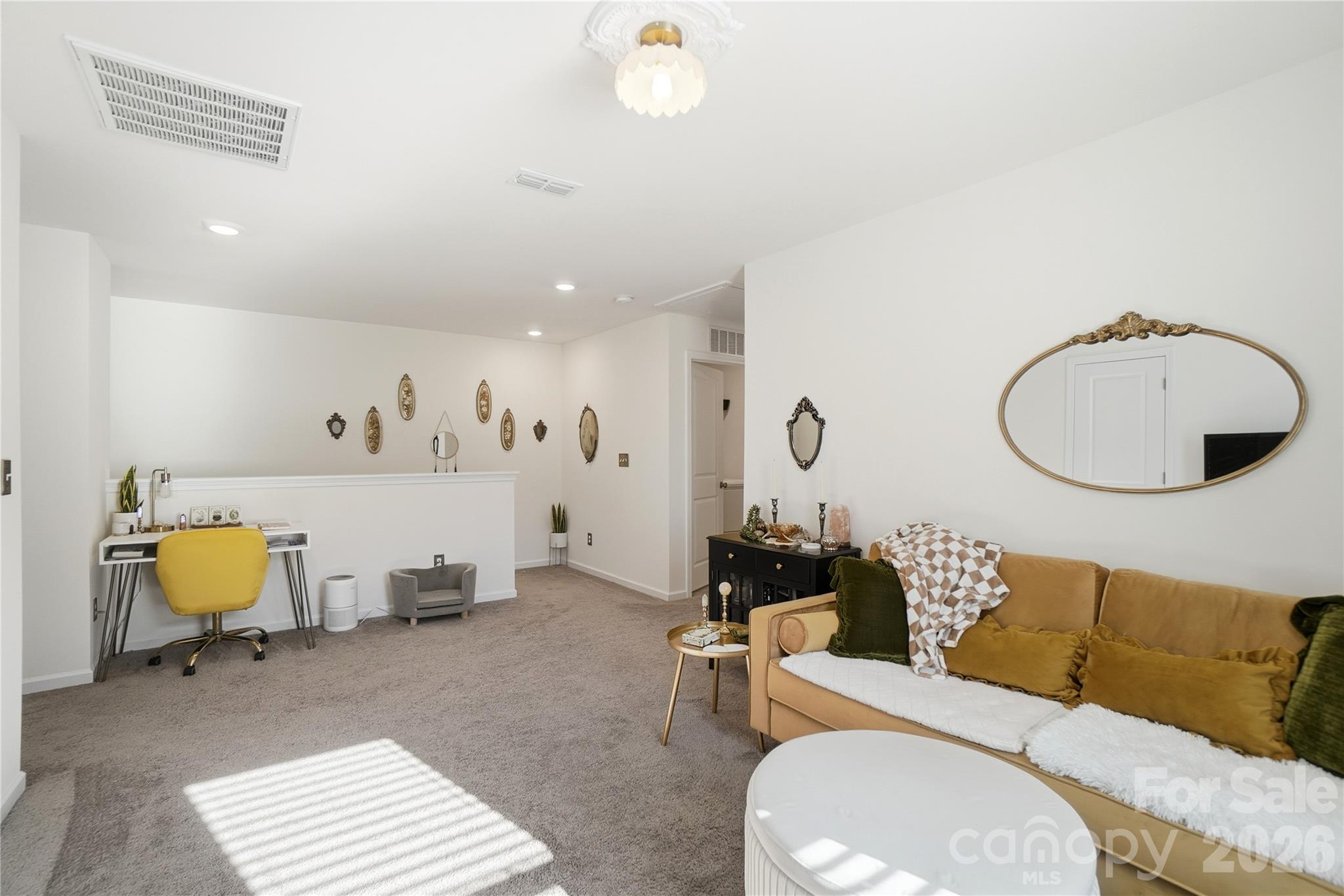3627 Secrest Landing Monroe, NC 28110 - Photo 18 of 32 a living room with furniture and wooden floor