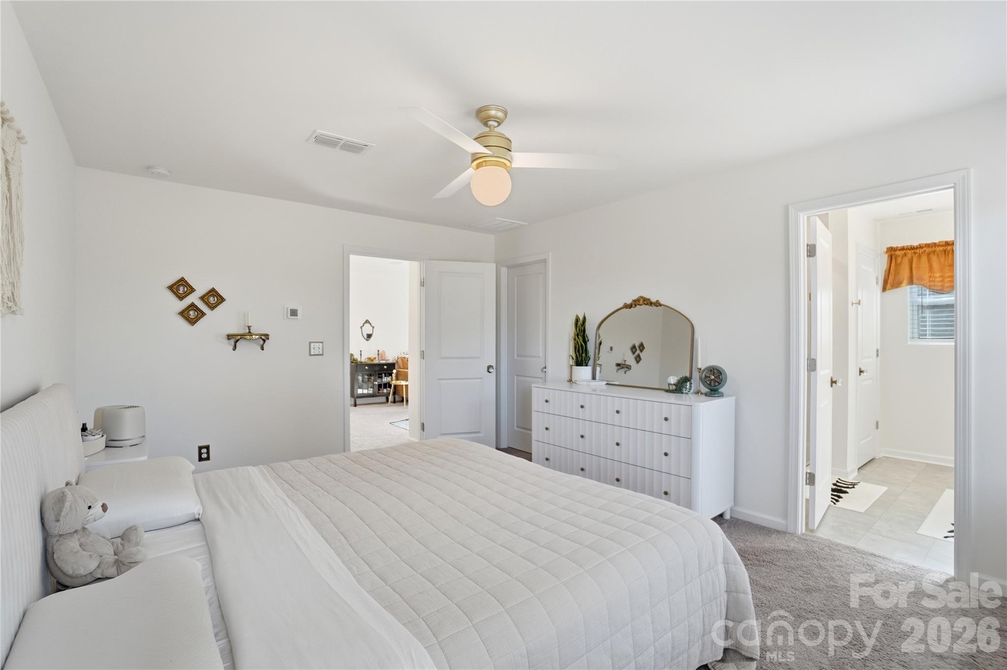 3627 Secrest Landing Monroe, NC 28110 - Photo 20 of 32 a bedroom with a bed and a dresser