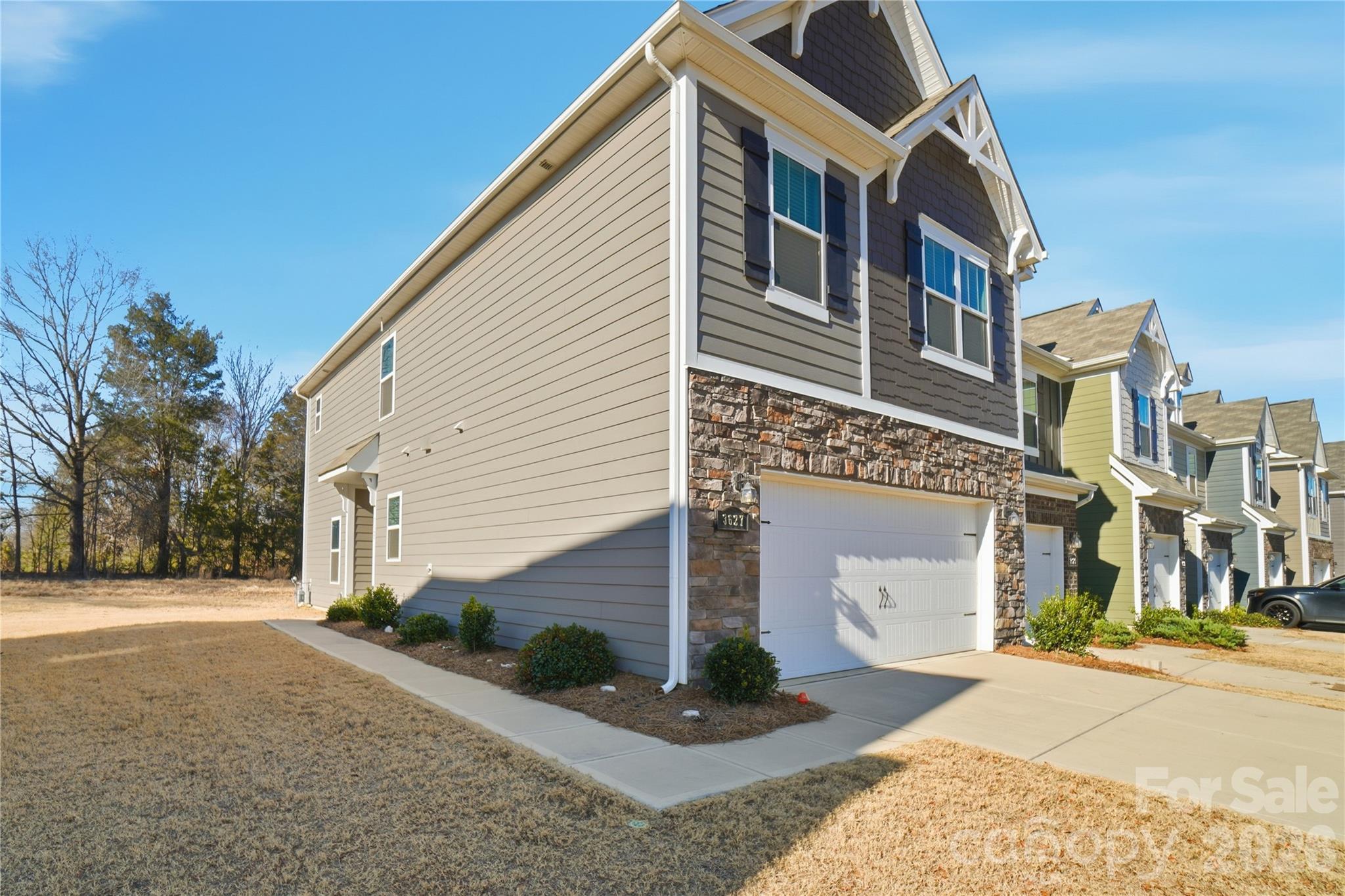3627 Secrest Landing Monroe, NC 28110 - Photo 2 of 32 a front view of a house with a yard