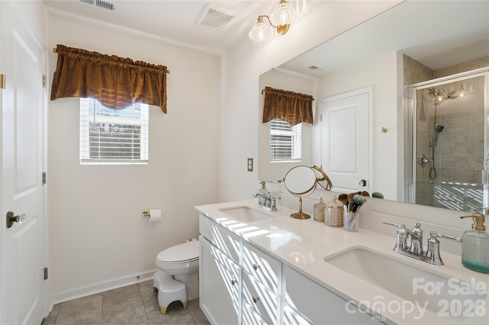 3627 Secrest Landing Monroe, NC 28110 - Photo 21 of 32 a bathroom with a sink toilet and shower
