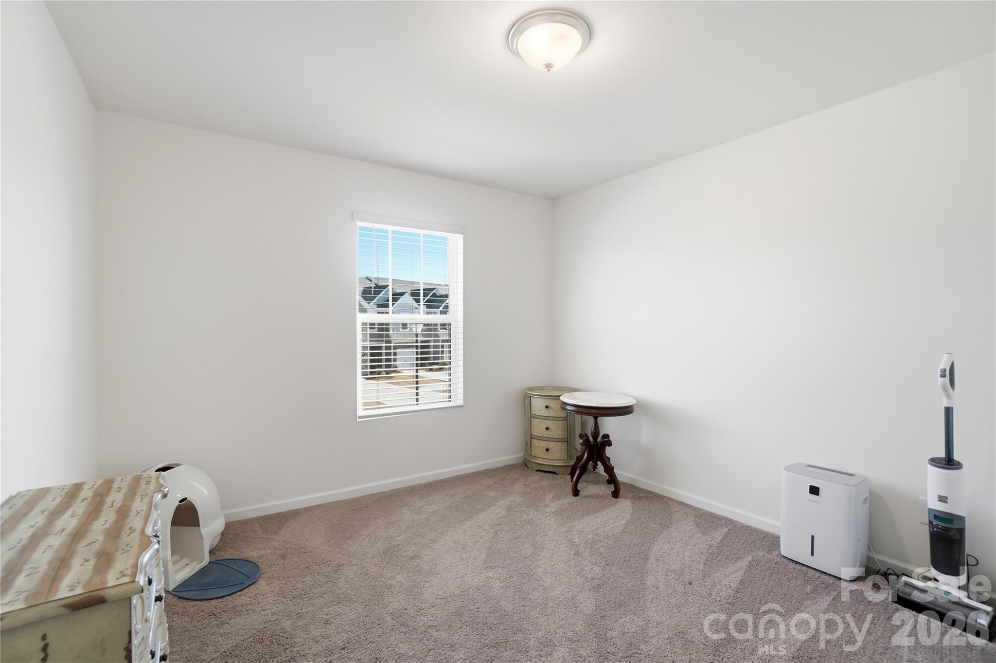 3627 Secrest Landing Monroe, NC 28110 - Photo 25 of 32 a view of an empty room with a window